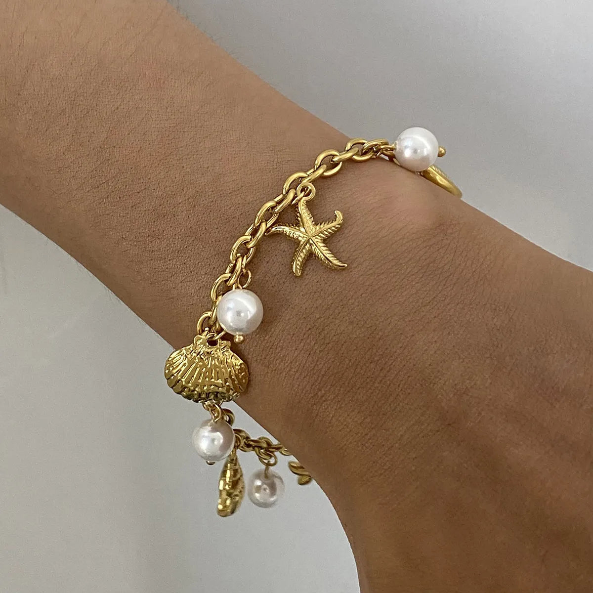 Bracelet Chaîne Thème Océan avec Coquillages et Étoiles de Mer