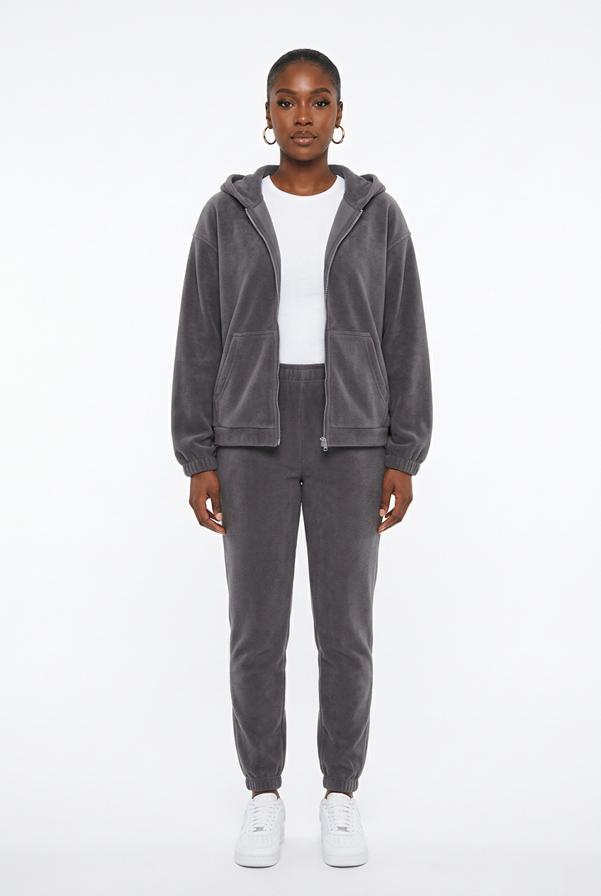 Ensemble sweat zippé et jogging gris foncé porté de face