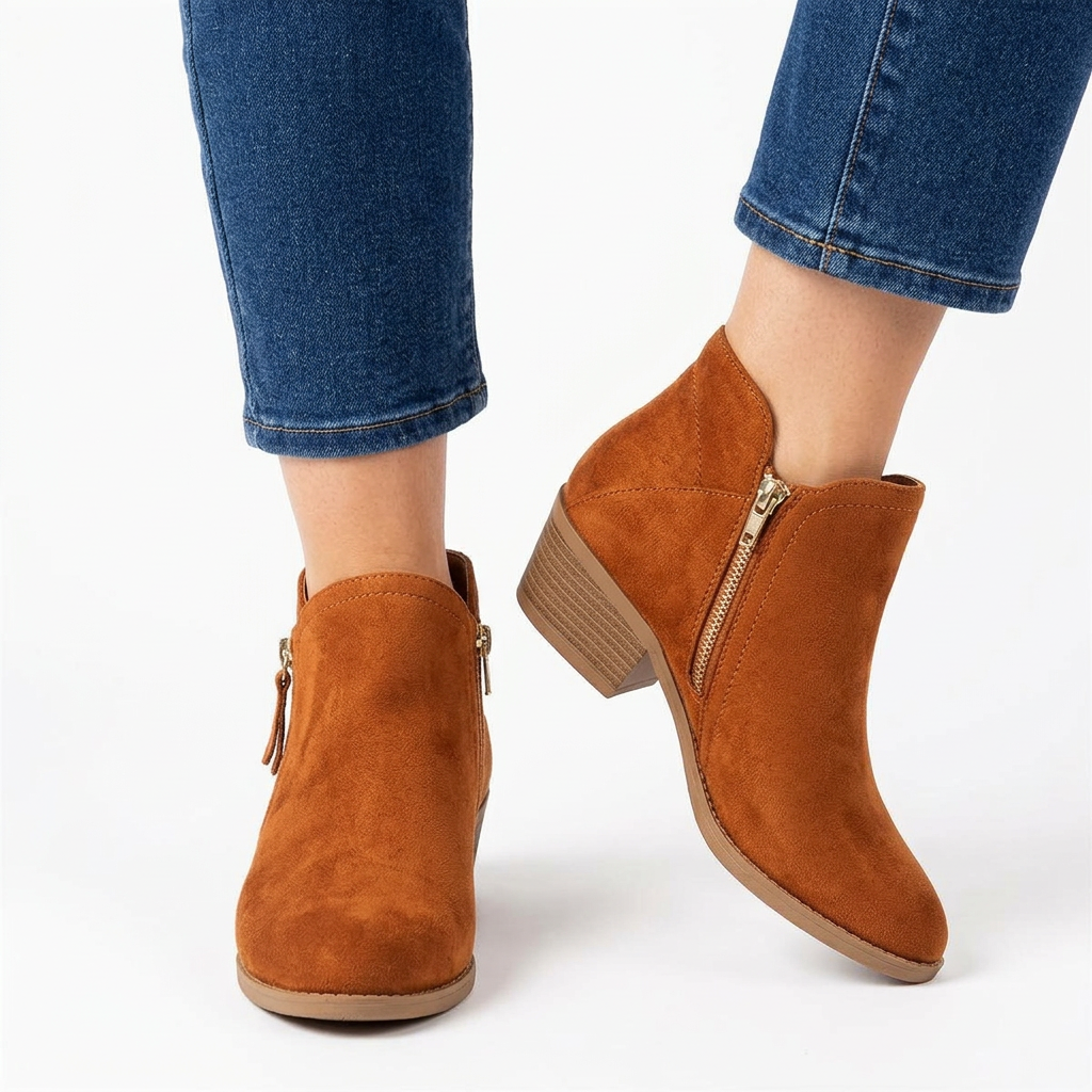 Bottines orange portées en plan serré