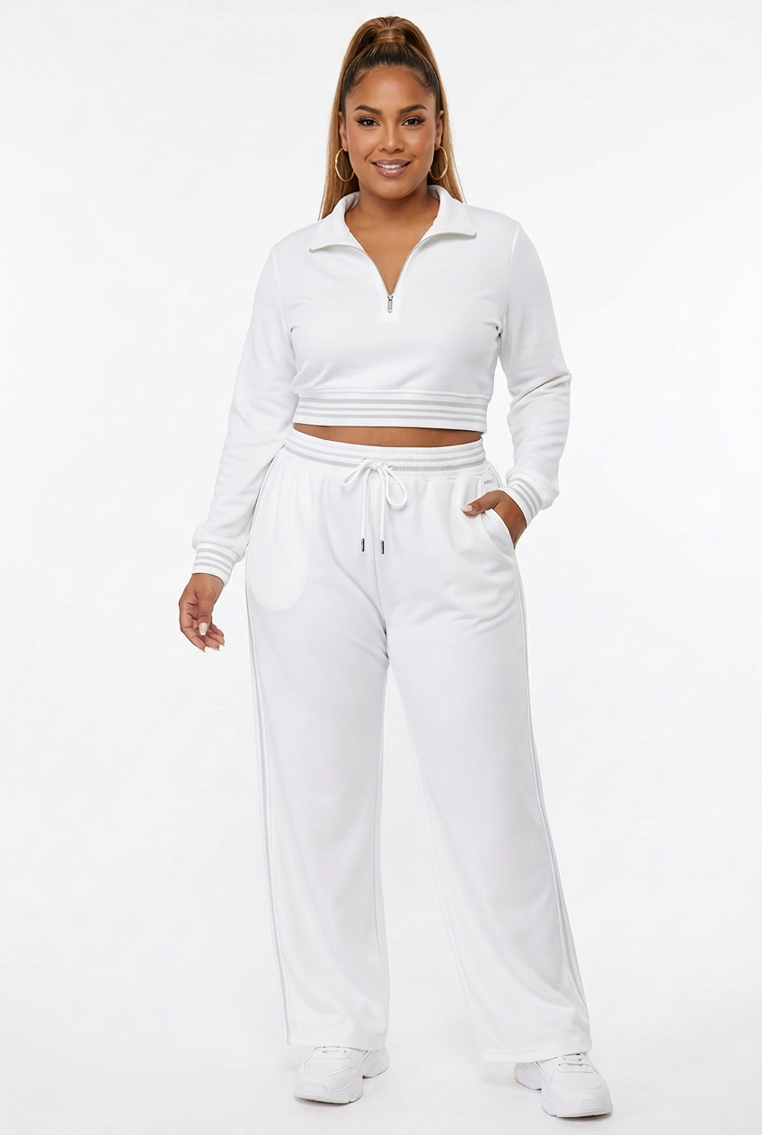 Ensemble blanc porté de face corps entier sur fond studio blanc
