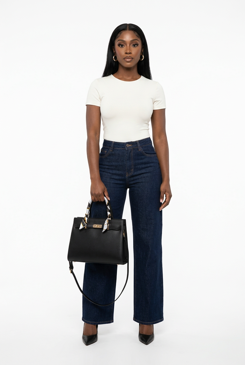 Sac noir à poignée porté de face sur mannequin corps entier