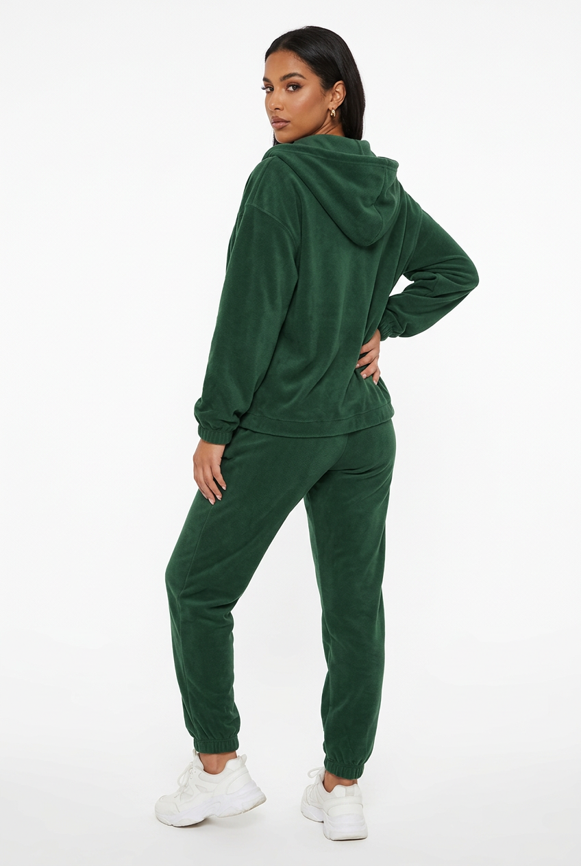 Ensemble vert foncé porté de dos